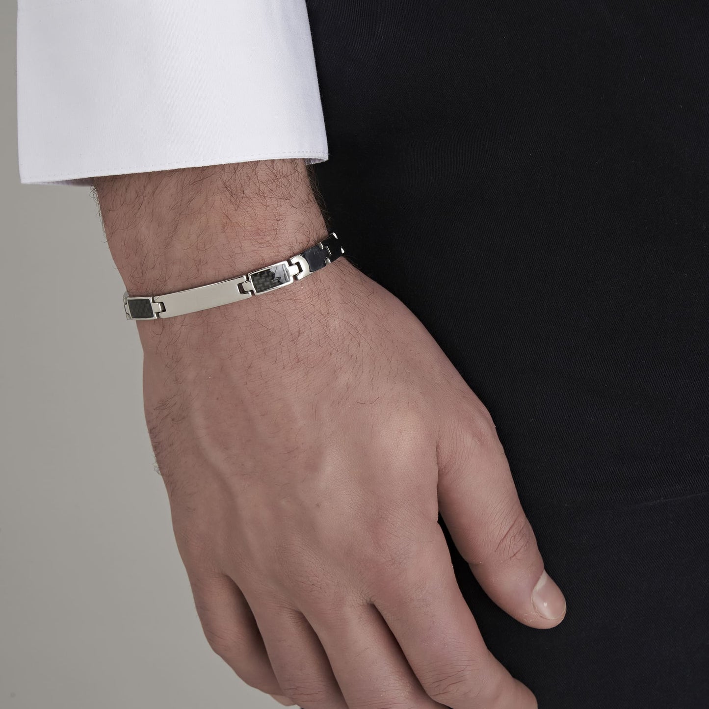 BRACELET POUR HOMME AVEC PLAQUE D'ACIER ET ÉLÉMENTS NOIRS