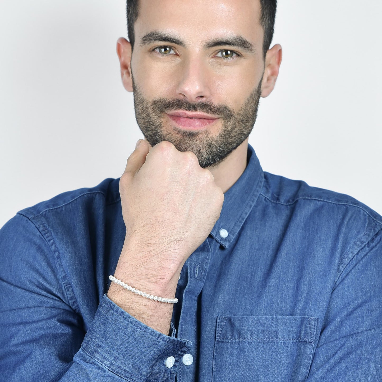 BRACCIALE UOMO IN ACCIAIO CON PERLE SINTETICHE BIANCHE