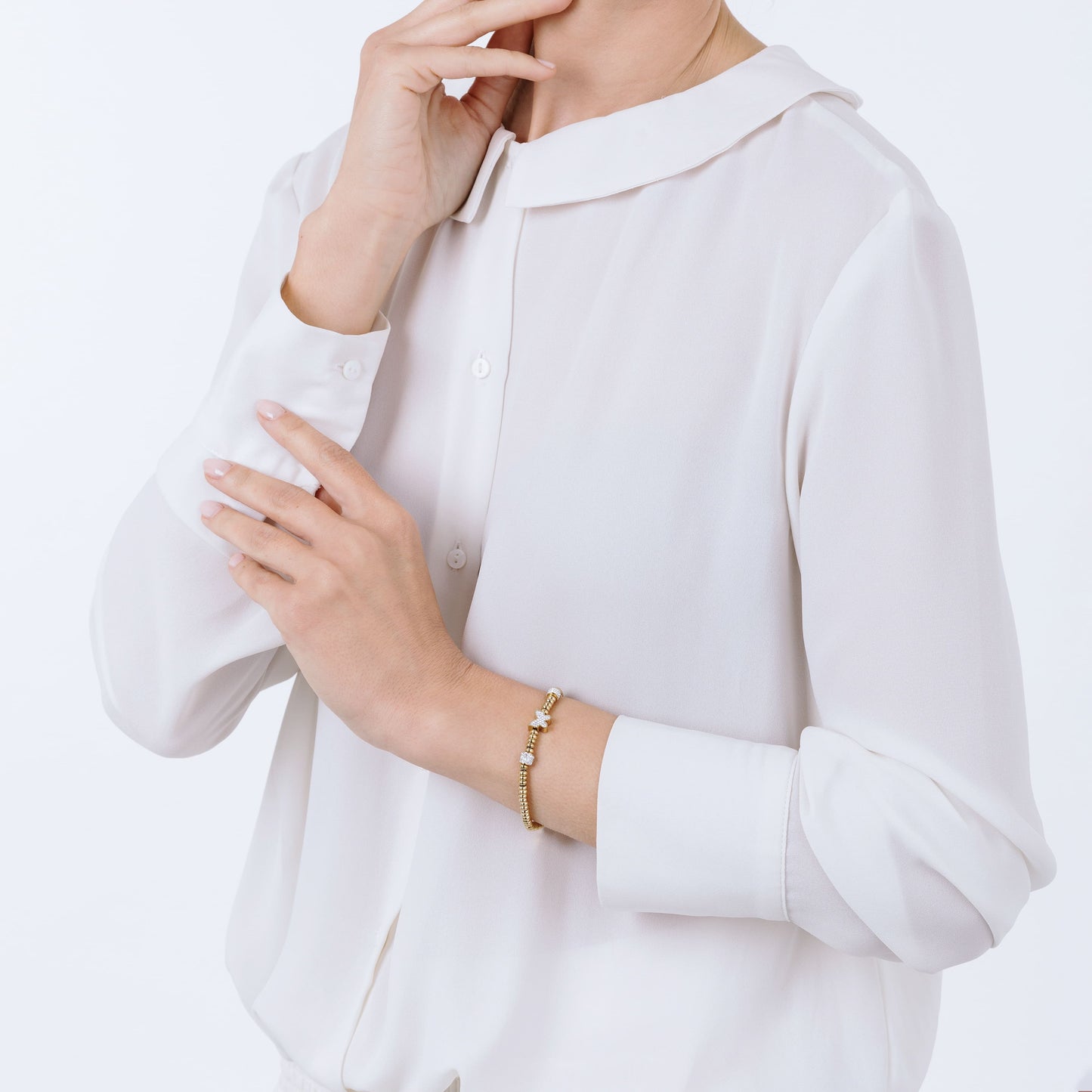 BRACELET ACIER OR IP AVEC PAPILLON EN CRISTAL BLANC