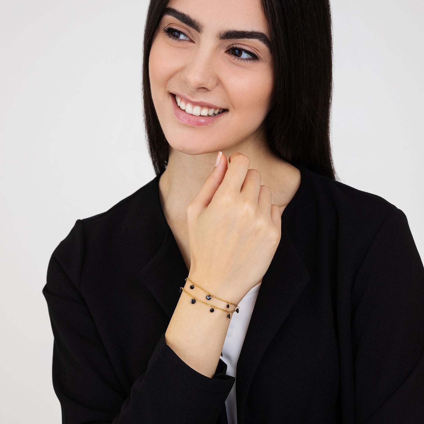 BRACELET FEMME EN ACIER PLAQUÉ OR AVEC CRISTAUX NOIRS