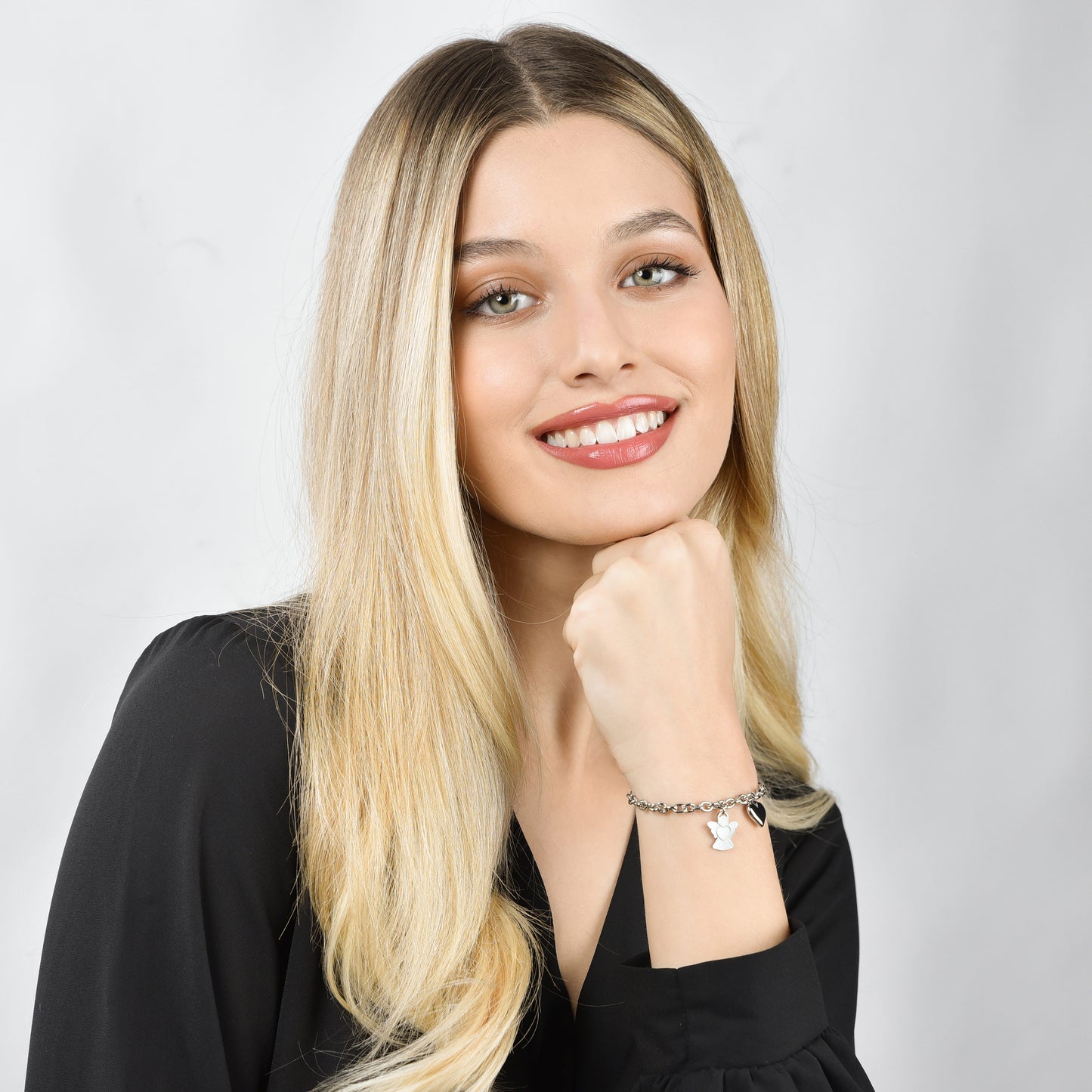 BRACELET FEMME EN ACIER AVEC BRELOQUE ANGE ET COEUR