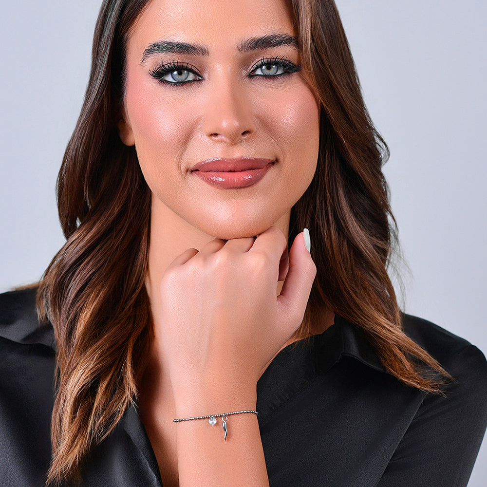 BRACCIALE DONNA IN ACCIAIO CORNO E ZIRCONE