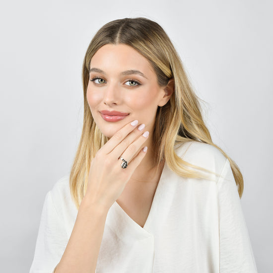 BAGUE EN ACIER POUR FEMMES AVEC TRÈFLE À QUATRE FEUILLES