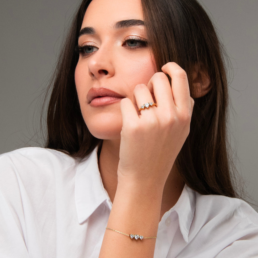 ANELLO DONNA IN ACCIAIO IP GOLD CON CUORI CON ZIRCONI BIANCHI