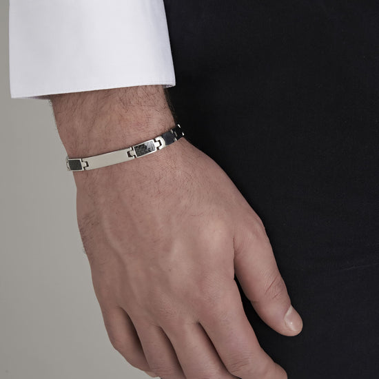 BRACELET POUR HOMME AVEC PLAQUE D'ACIER ET ÉLÉMENTS NOIRS
