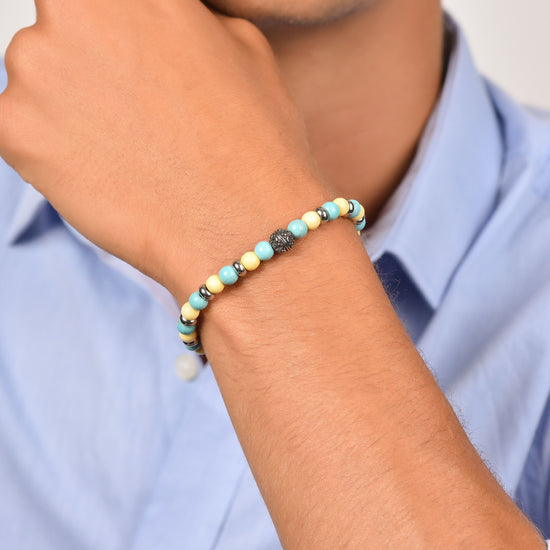 BRACELET ELASTIQUE POUR HOMME AVEC PIERRES TURQUOISE ET JAUNES ET ELEMENTS EN ACIER Luca Barra