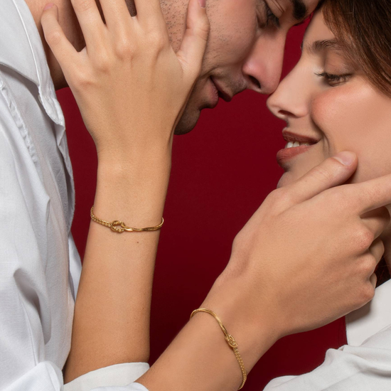 BRACCIALE UOMO IN ACCIAIO CON NODO E ZIRCONI BIANCHI