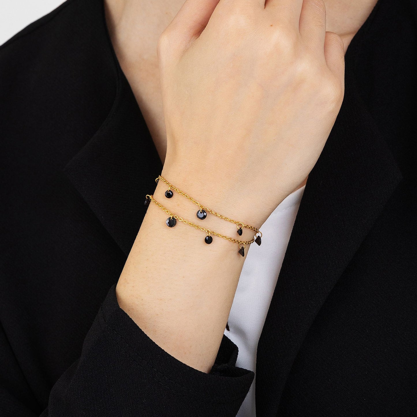 BRACELET D'ACIER DORÉ POUR FEMME AVEC CRISTAUX NOIRS Luca Barra