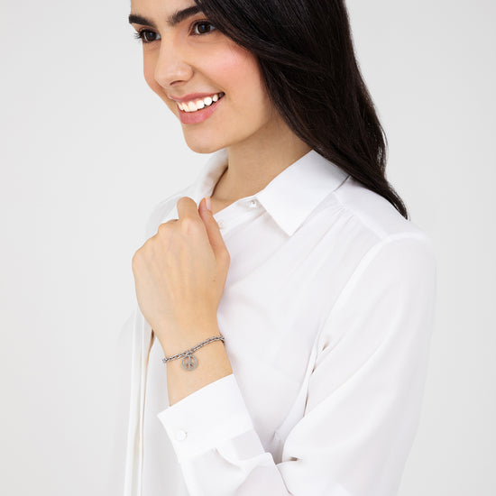 BRACELET EN ACIER POUR FEMMES AVEC SYMBOLE DE LA PAIX