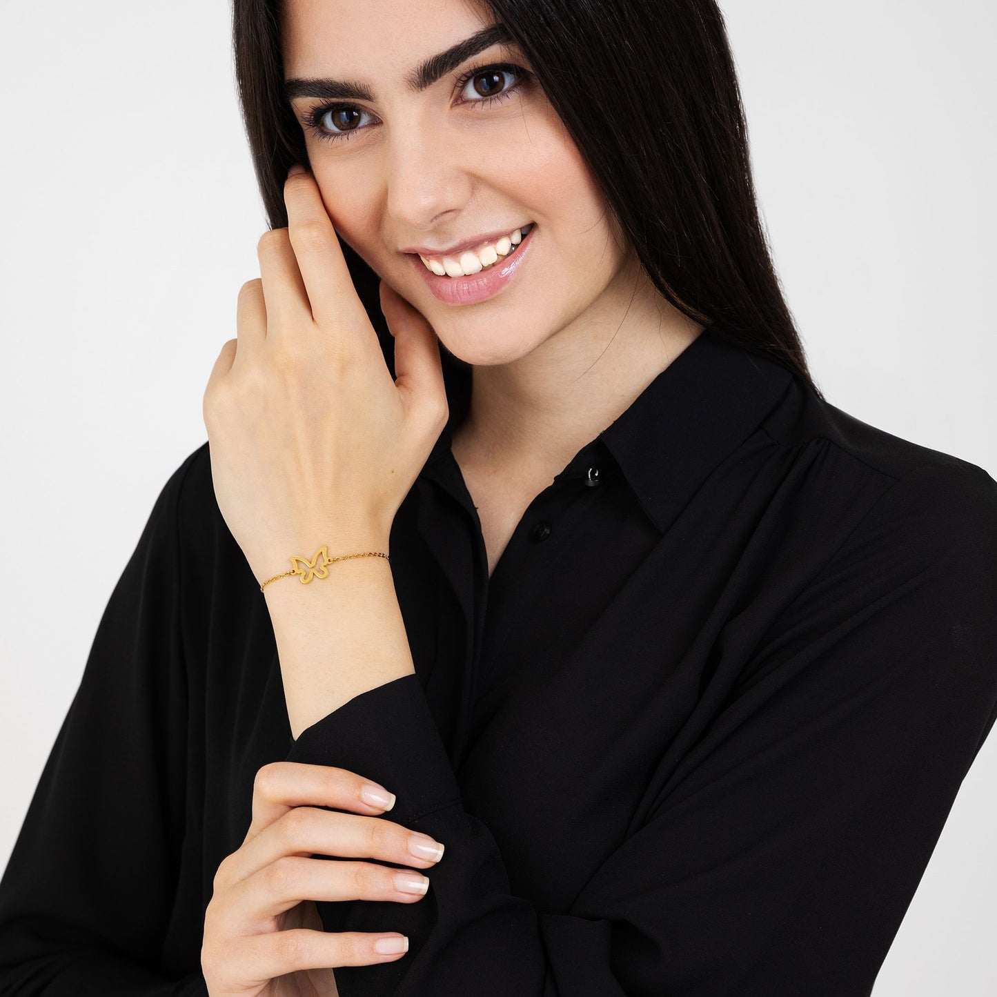 BRACELET POUR FEMME EN ACIER PLAQUÉ OR AVEC PAPILLON CREUX