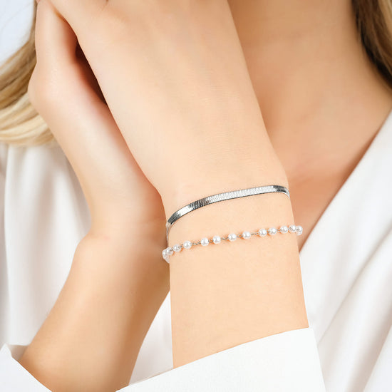 BRACELET FEMME EN ACIER AVEC PERLES BLANCHES
