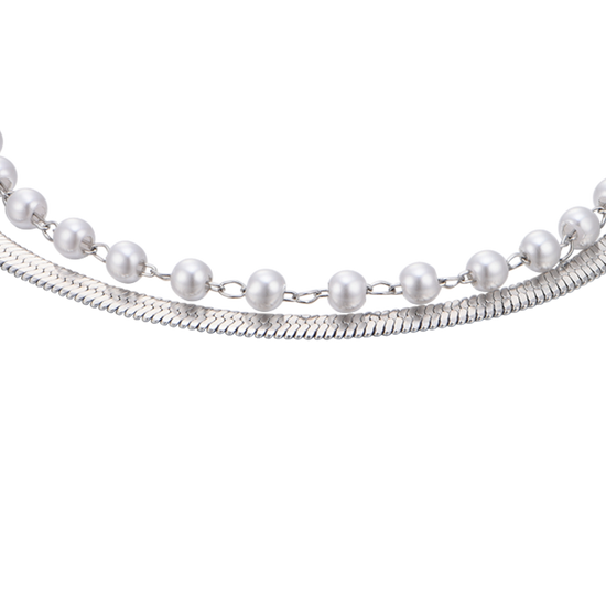 BRACELET FEMME EN ACIER AVEC PERLES BLANCHES