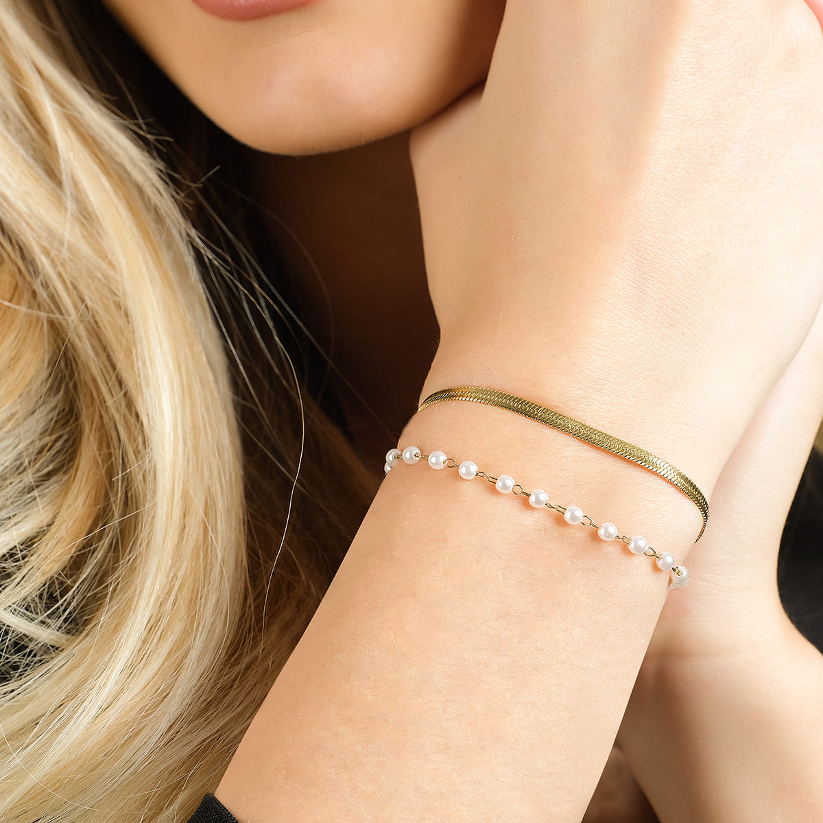 BRACELET FEMME EN ACIER AVEC PERLES BLANCHES