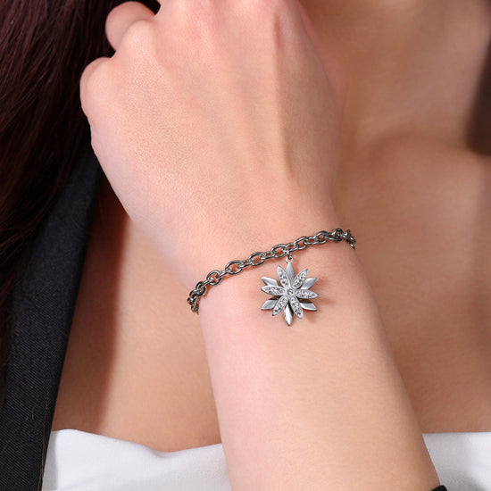 BRACELET PIVOTANT EN ACIER FLEUR DE VIE