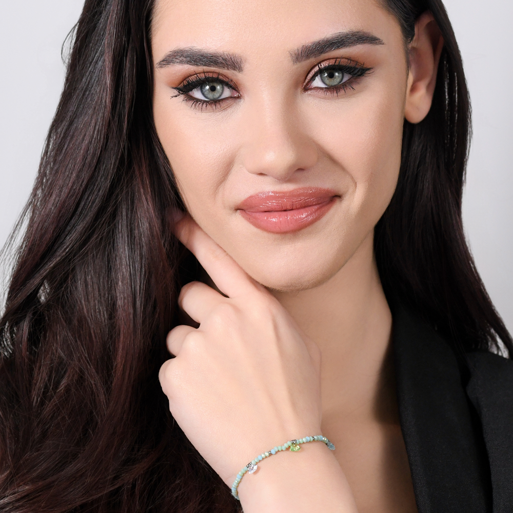 BRACELET FEMME EN ACIER AVEC PIERRES ET CRISTAUX VERT D'EAU