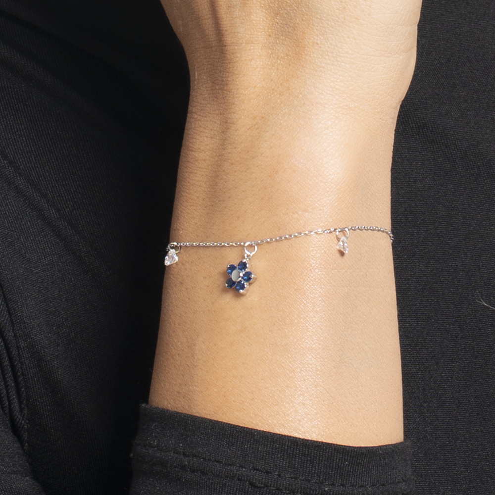 BRACCIALE DONNA IN ACCIAIO CON PENDENTE FIORE E PETALI ZIRCONE BLU