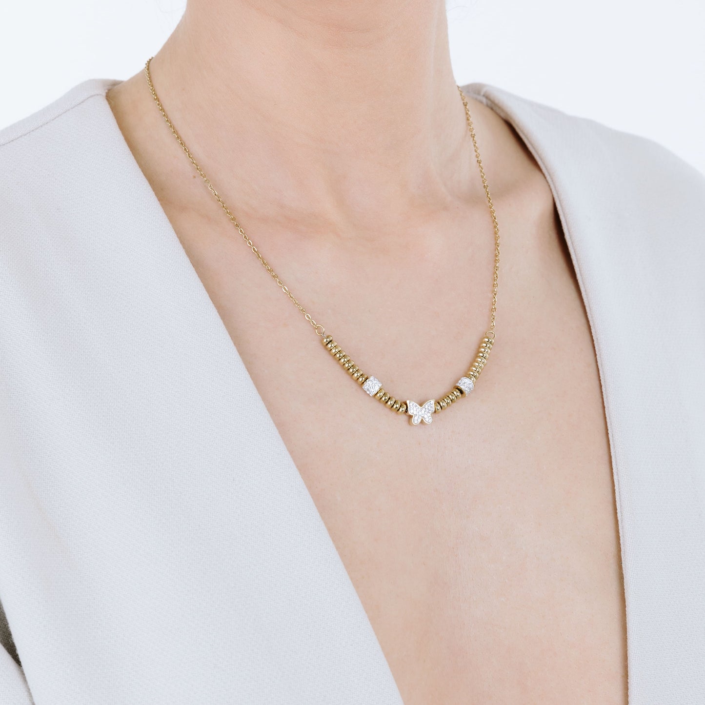 COLLIER EN ACIER D'OR IP AVEC PAPILLON AVEC CRISTAUX BLANCS Luca Barra