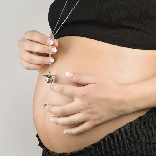 COLLIER D'APPEL D'ANGE EN ACIER AVEC MANNEQUIN EN MÉTAL ROSE IP