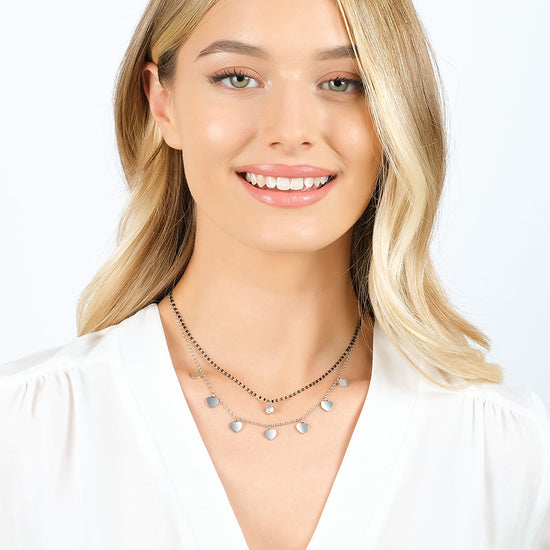 COLLIER EN ACIER POUR DAMES AVEC CŒURS, ÉLÉMENTS IP NOIRS ET CRISTAL BLANC