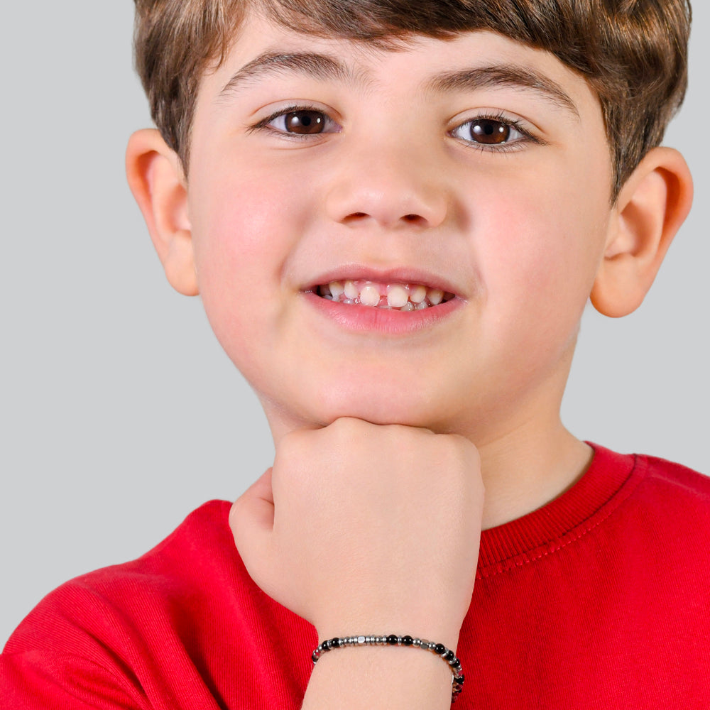 BRACELET BÉBÉ EN ACIER AVEC PIERRES NOIRES ET GRISES