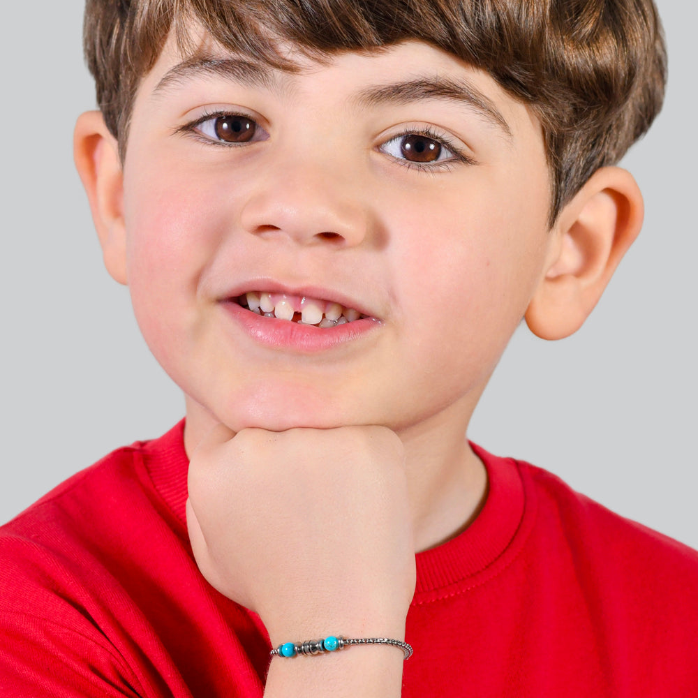 BRACELET BÉBÉ EN ACIER AVEC PIERRES TURQUOISES