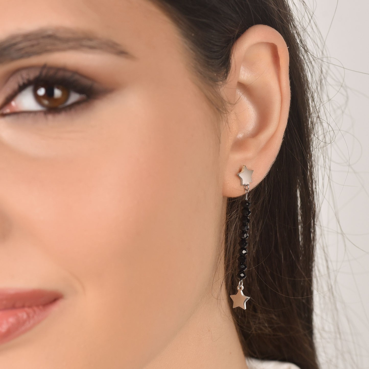 BOUCLES D'OREILLES POUR FEMME EN ACIER AVEC CRISTAUX ET ÉTOILES NOIRES Luca Barra