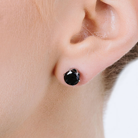 BOUCLES D'OREILLES SPOT EN ACIER AVEC CRISTAL NOIR